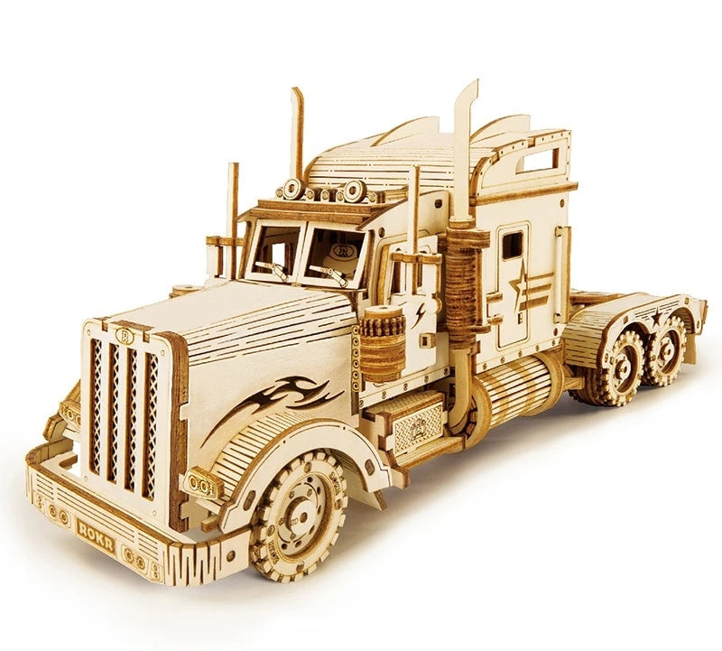 A collection of wooden scale model vehicles including a train locomotive and a truck, manufactured by Robotime.