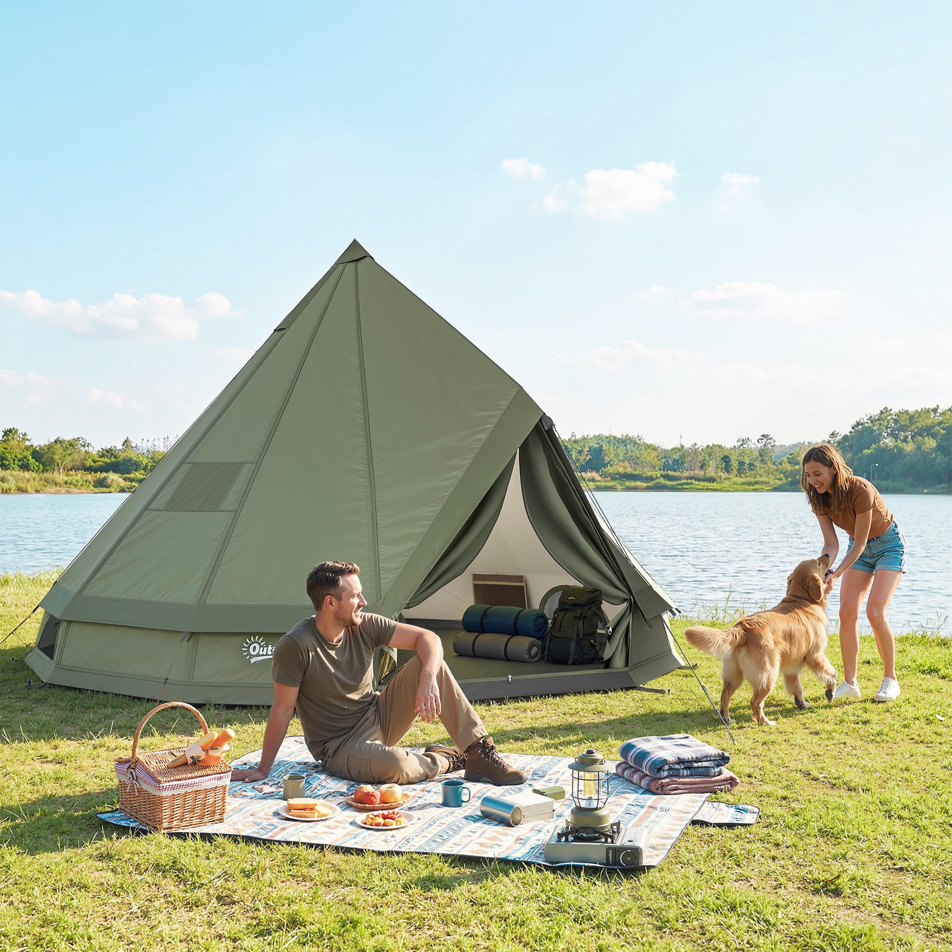 Man and woman with a dog by a tent by a lake