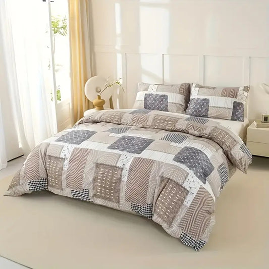 Patchwork quilt set on a bed in a bedroom with neutral decor.